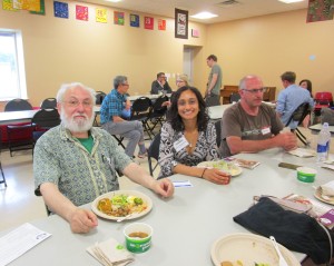 Board Members Talat and Aiman enjoy a snack at the 2015 Annual Meeting.