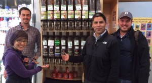 Jose, second from right, checking out GreenTree's coffee selection.